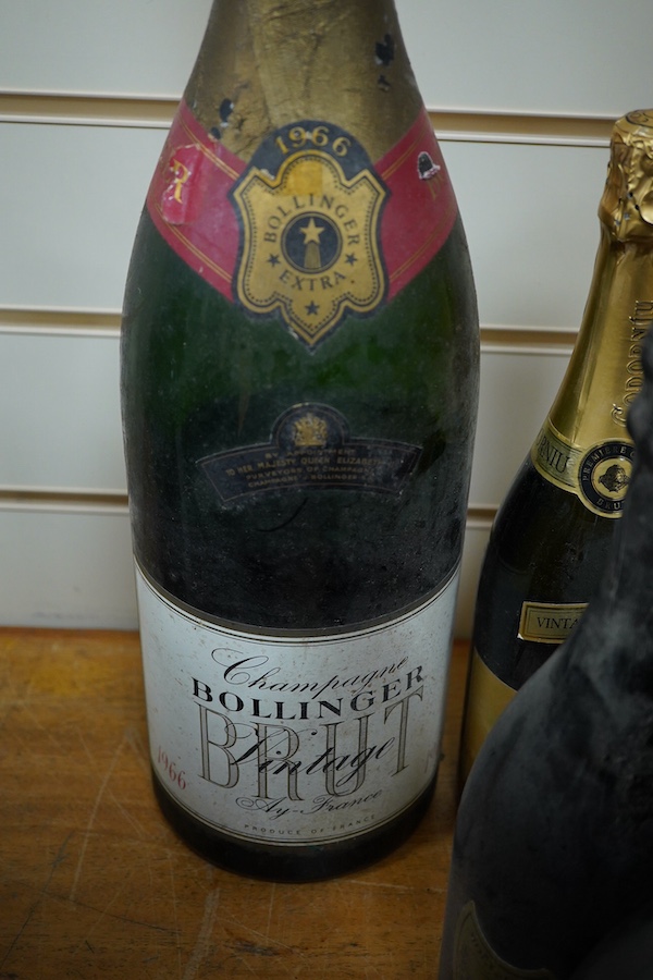 Eight bottles of champagne, including a jeroboam of Bollinger 1966 (poor level - mid body) six bottles of Dom Perignon to include 1964, 1966, 1971, 1980 and 1982 (2) and a Codorniu, 1990